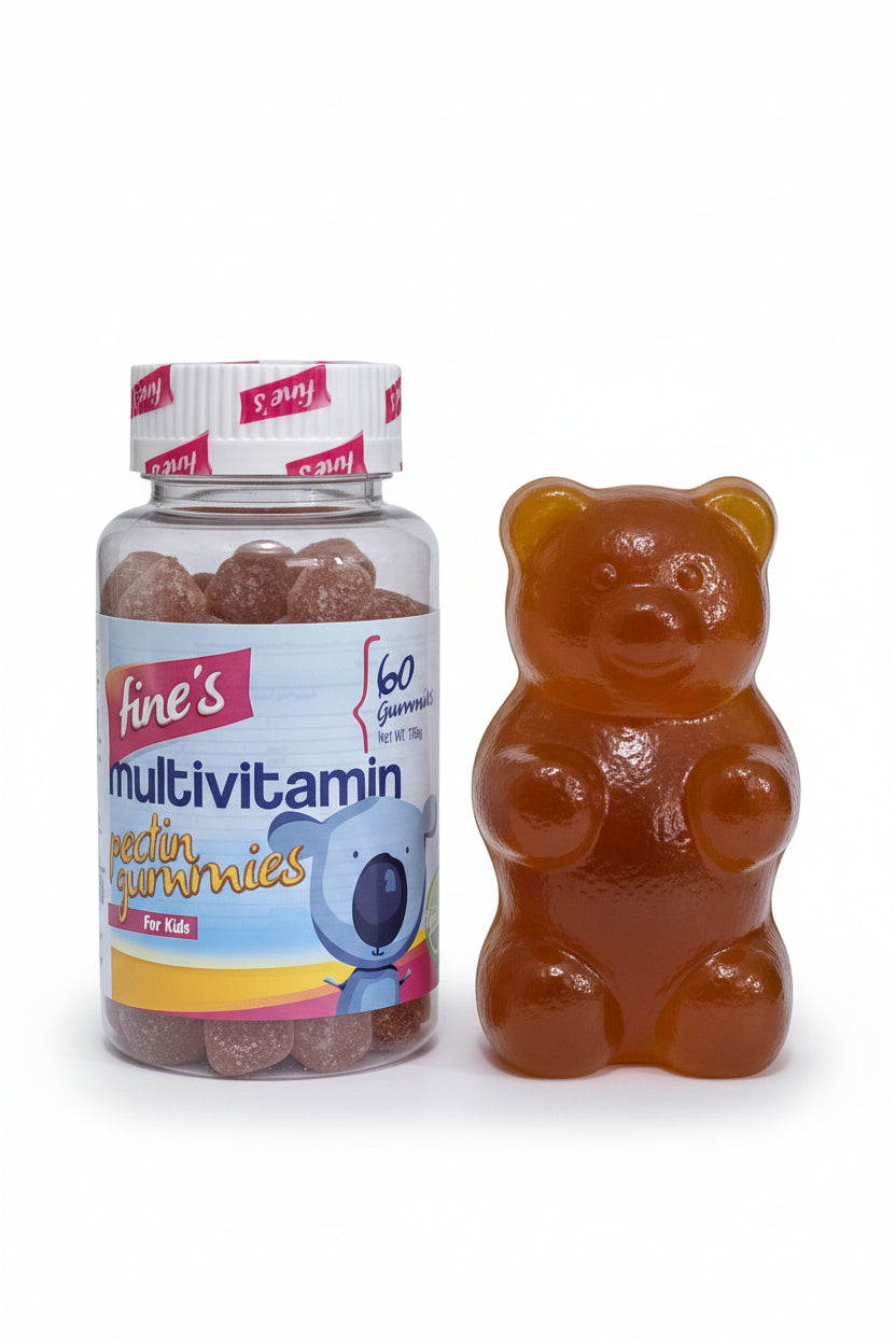 A bottle of Fine's Multivitamin Gummy Bears placed on a white desk sheet .